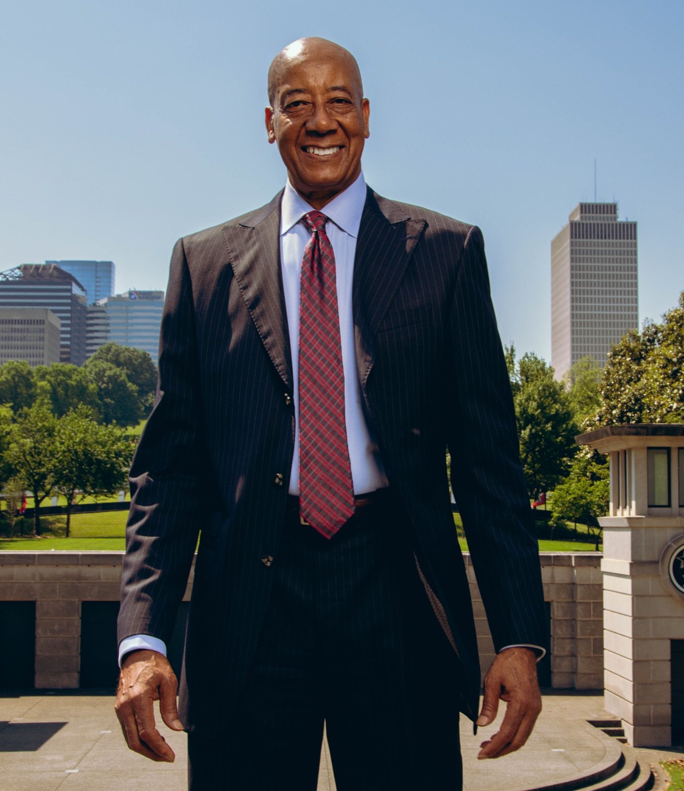 Dr. Joseph Webb standing with the Nashville skyline behind him